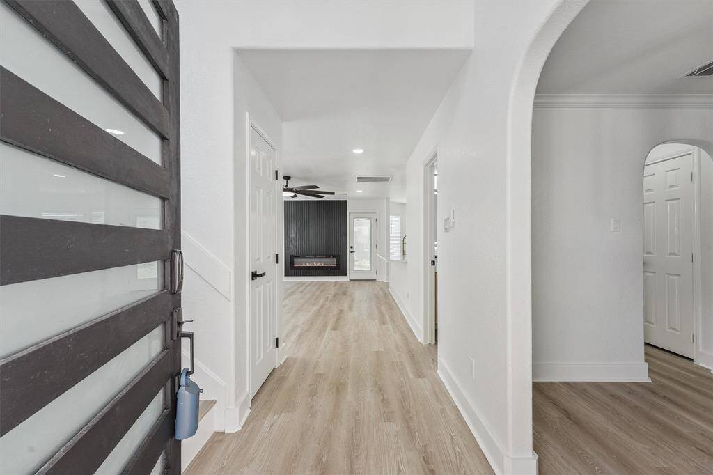 From the moment you enter, you're greeted by an open and airy layout filled with natural light.