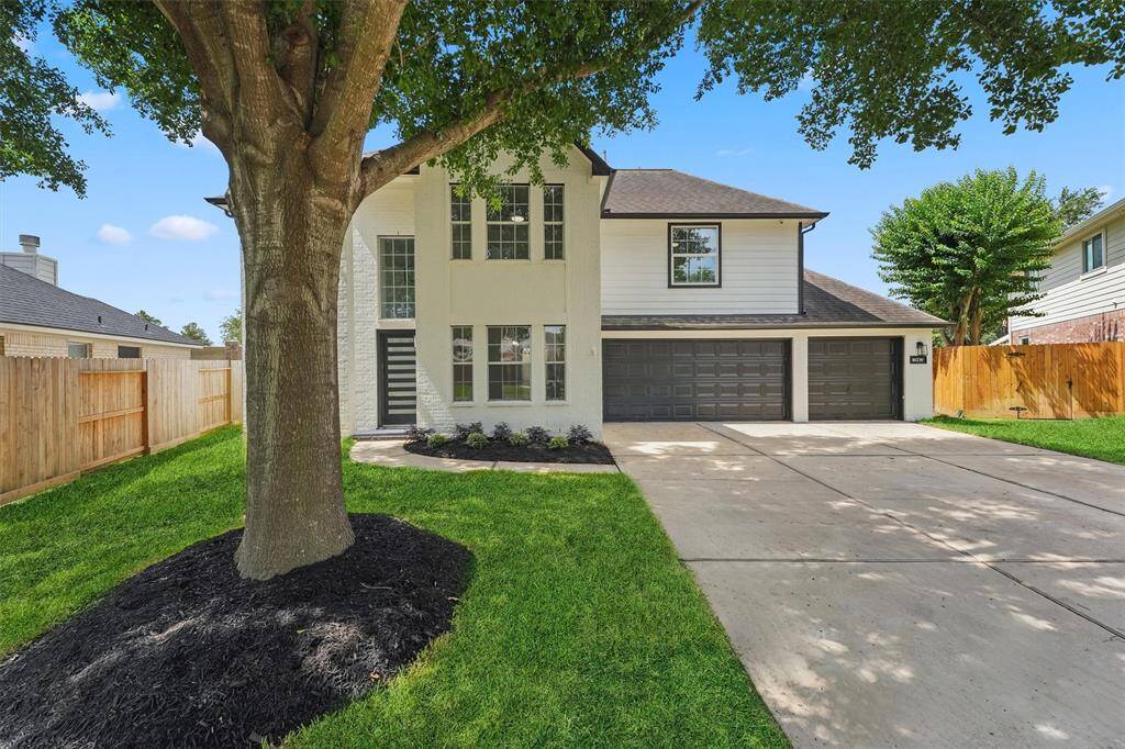 This inviting curb appeal captures the perfect blend of elegance and comfort as day transitions into night.