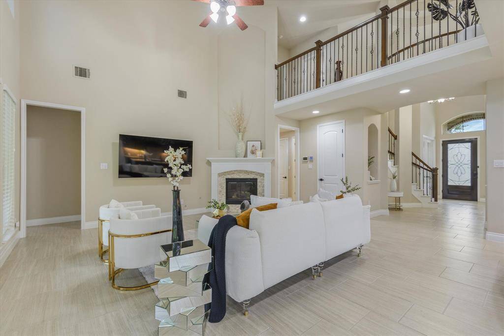 Bright living room opens to a spacious balcony, perfect for enjoying fresh air and natural light throughout the day.