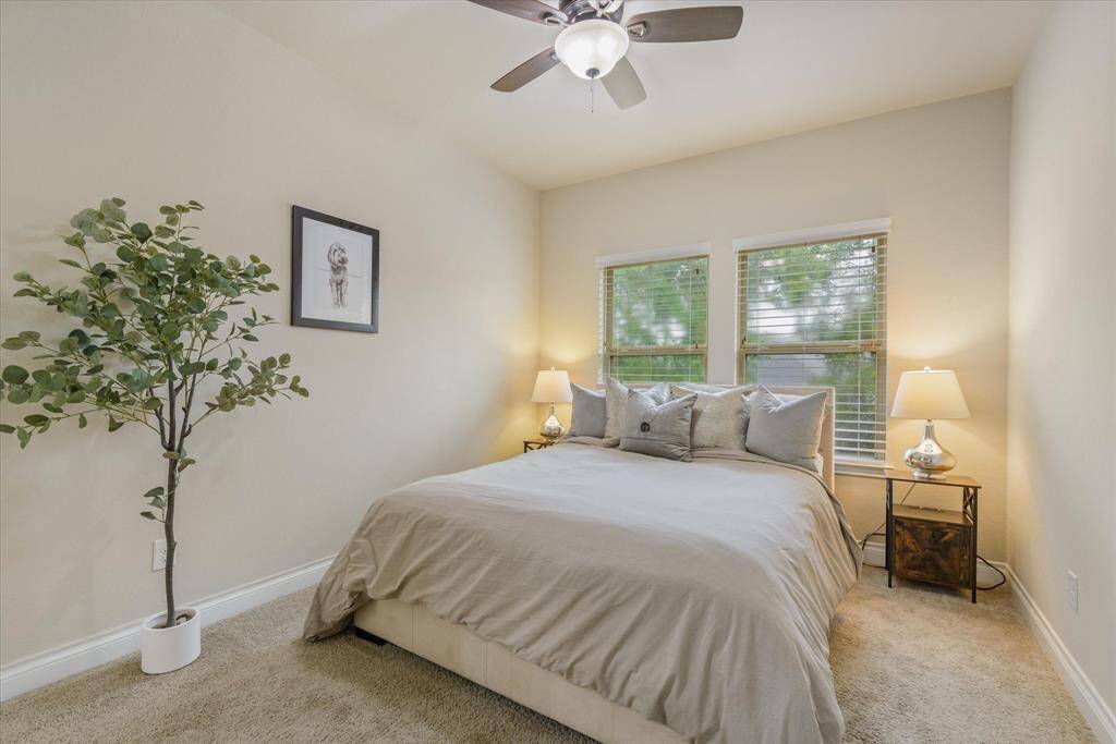 Bedroom 3 - Comfortable bedroom with generous natural light and plenty of closet space for storage.