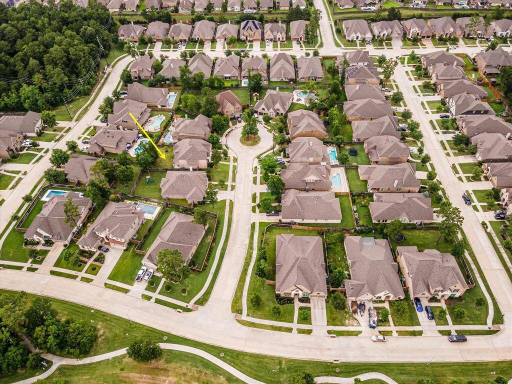Aerial drone shot capturing the entire neighborhood, highlighting the community layout and surrounding areas.