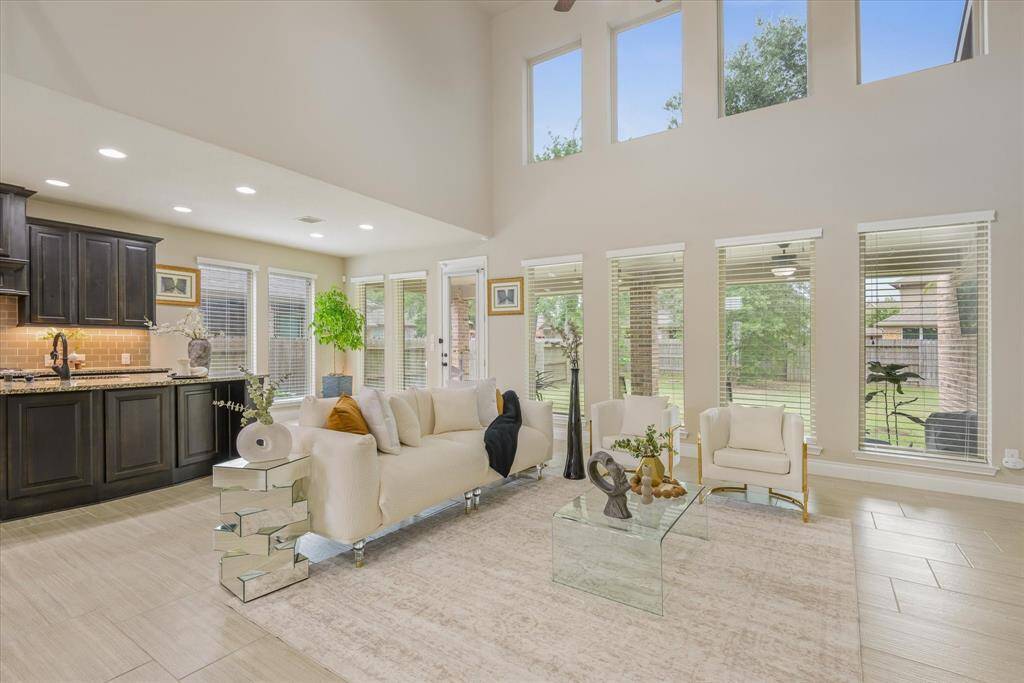 Bright and open living room with plenty of space to unwind or host gatherings in comfort and style.