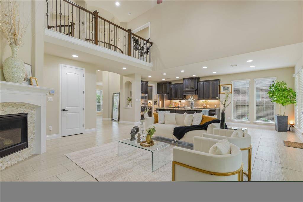 Open living area flows seamlessly to the kitchen and balcony, creating a perfect space for relaxing and entertaining.