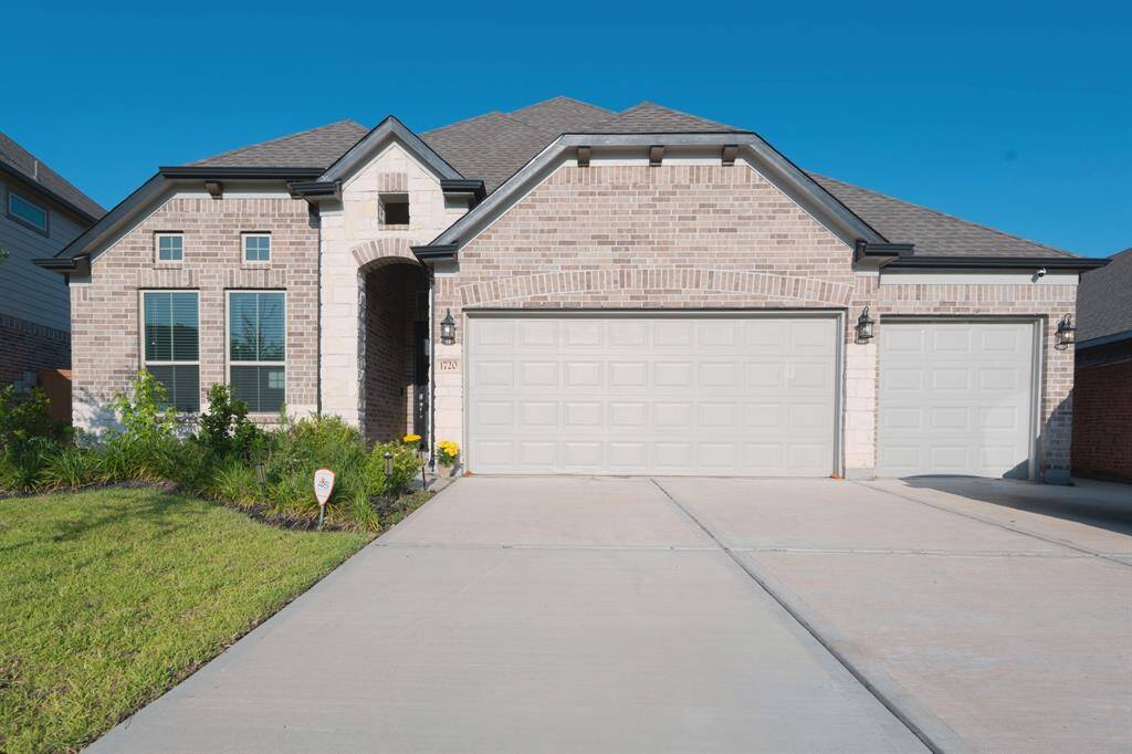 Beautiful elevation, widened driveway, and 3 car garages