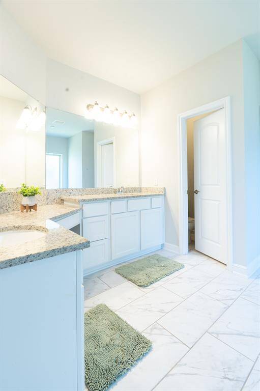 Another view of the bathroom with two sinks