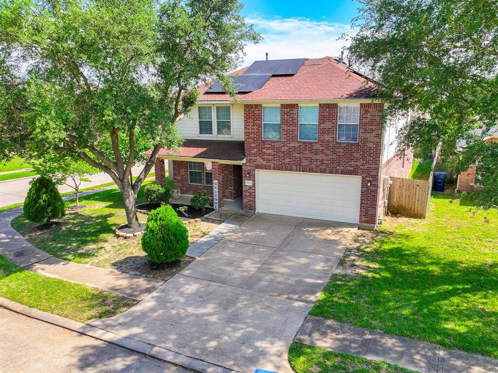 Charming corner lot with a cozy front patio — perfect for enjoying your morning coffee or relaxing in the afternoon