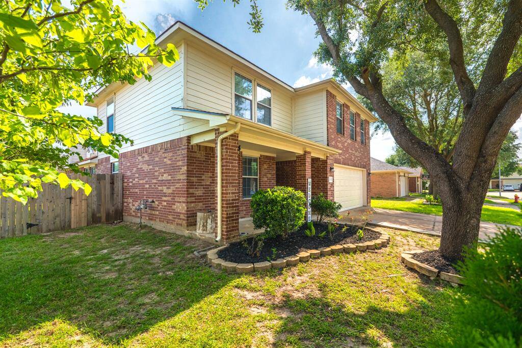 Charming corner lot with a cozy front patio — perfect for enjoying your morning coffee or relaxing in the afternoon