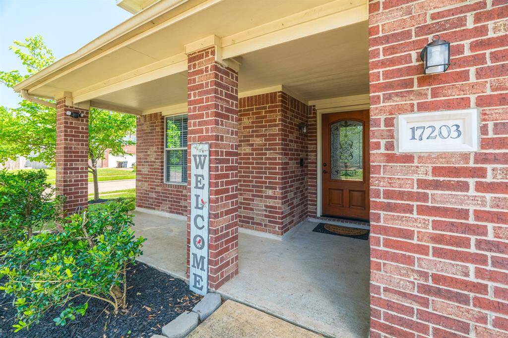 Charming corner lot with a cozy front patio — perfect for enjoying your morning coffee or relaxing in the afternoon