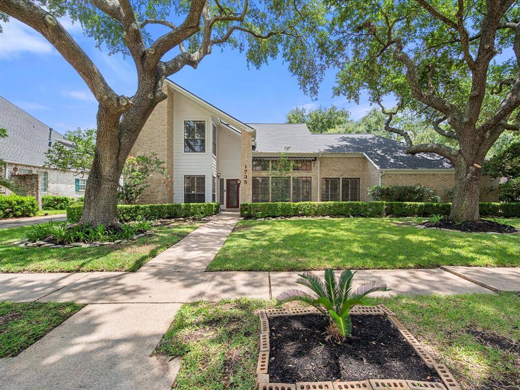 Grand property with charming curb appeal