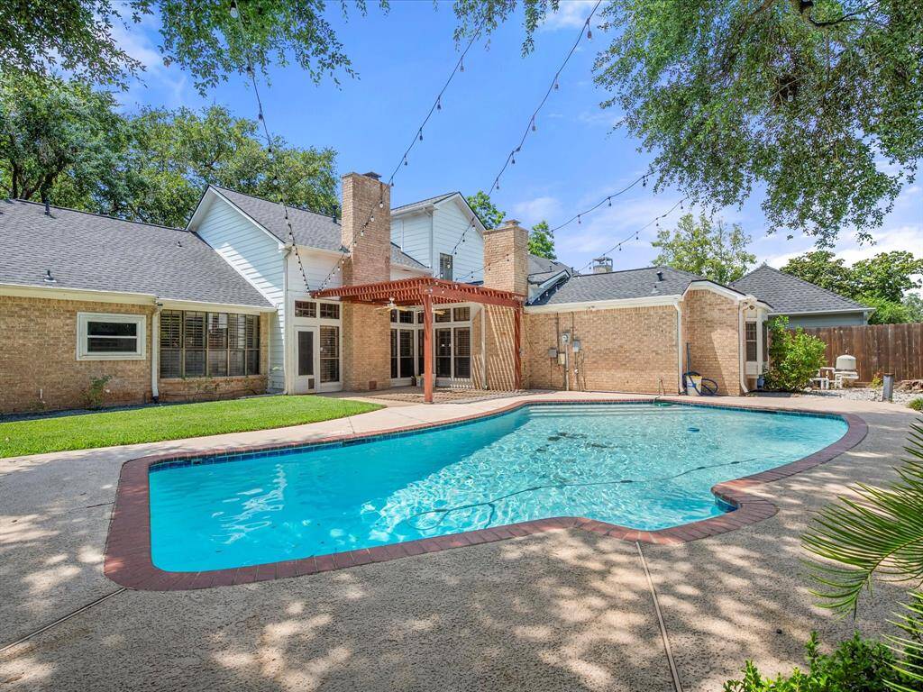 Inviting backyard pool offers the perfect blend of relaxation and recreation