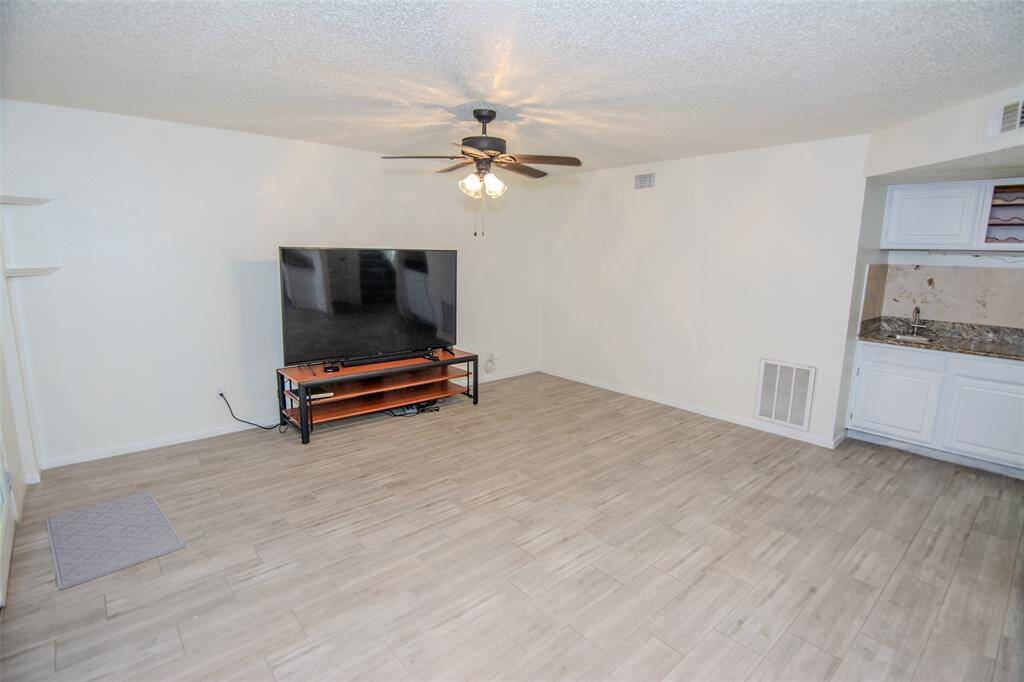 large den in back of property