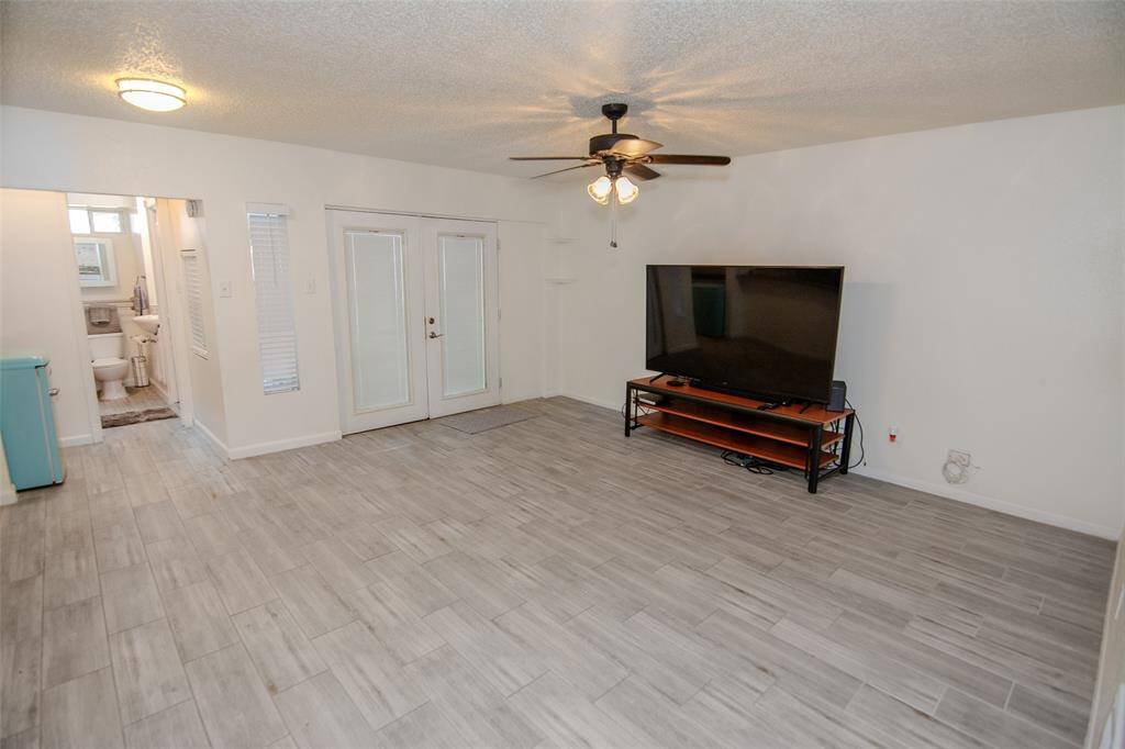 large den in back of property
