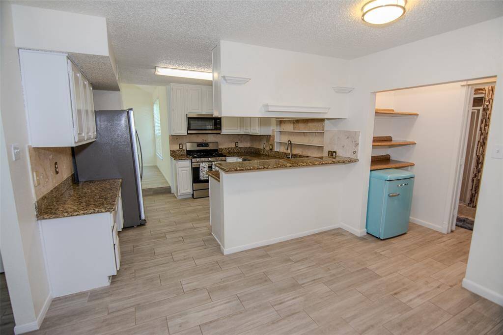 kitchen with bar area to sit