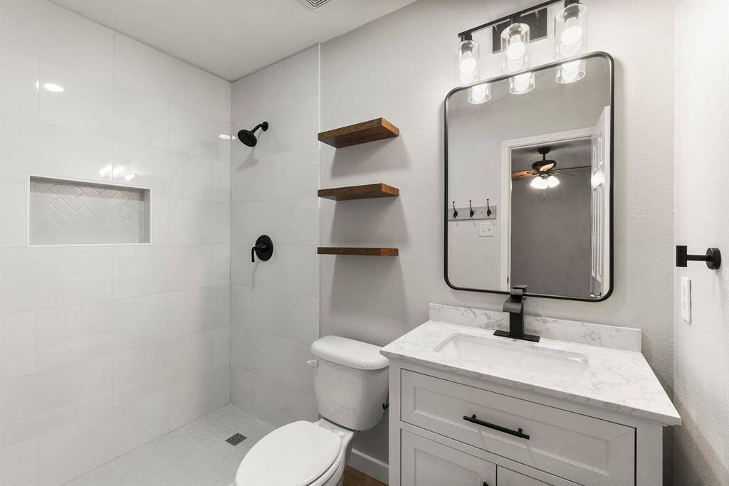 Primary Bath with Large custom floor to ceiling shower