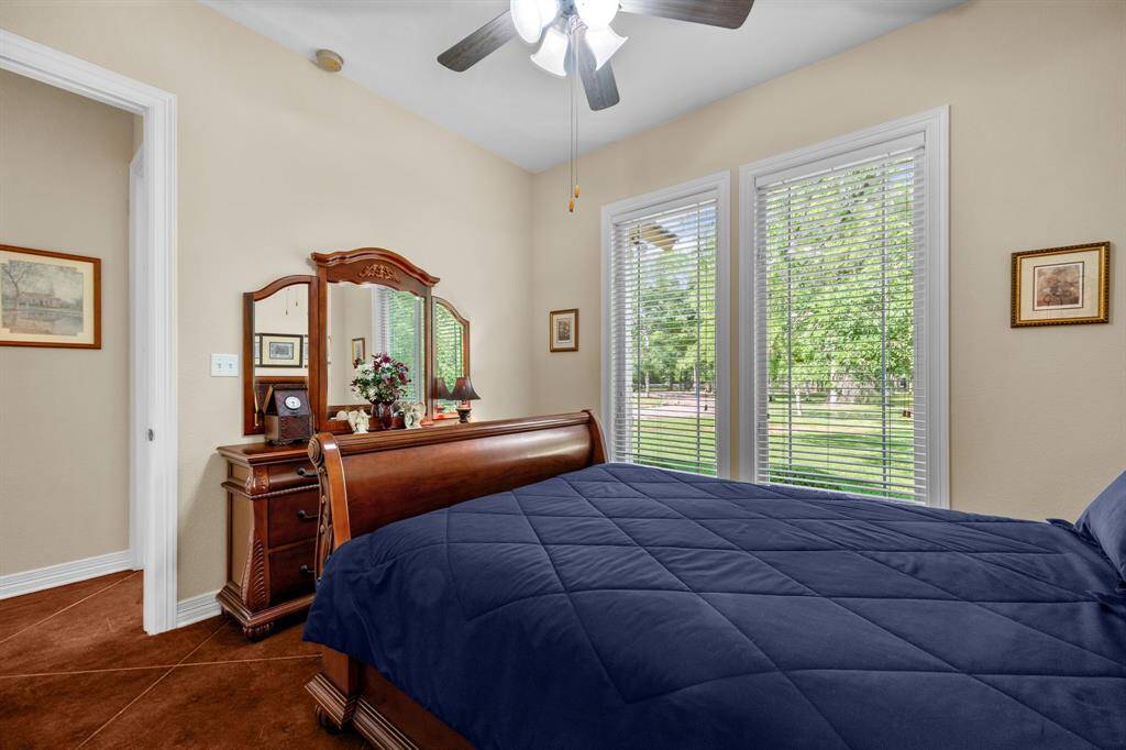 3rd bedroom with two large windows.