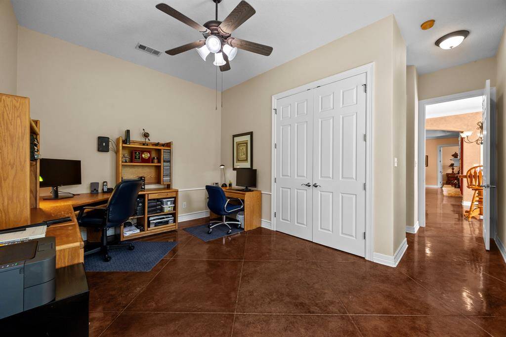 Flexible room to use as an office or second en-suite offers plentiful storage and seamless flow back to the main living areas.