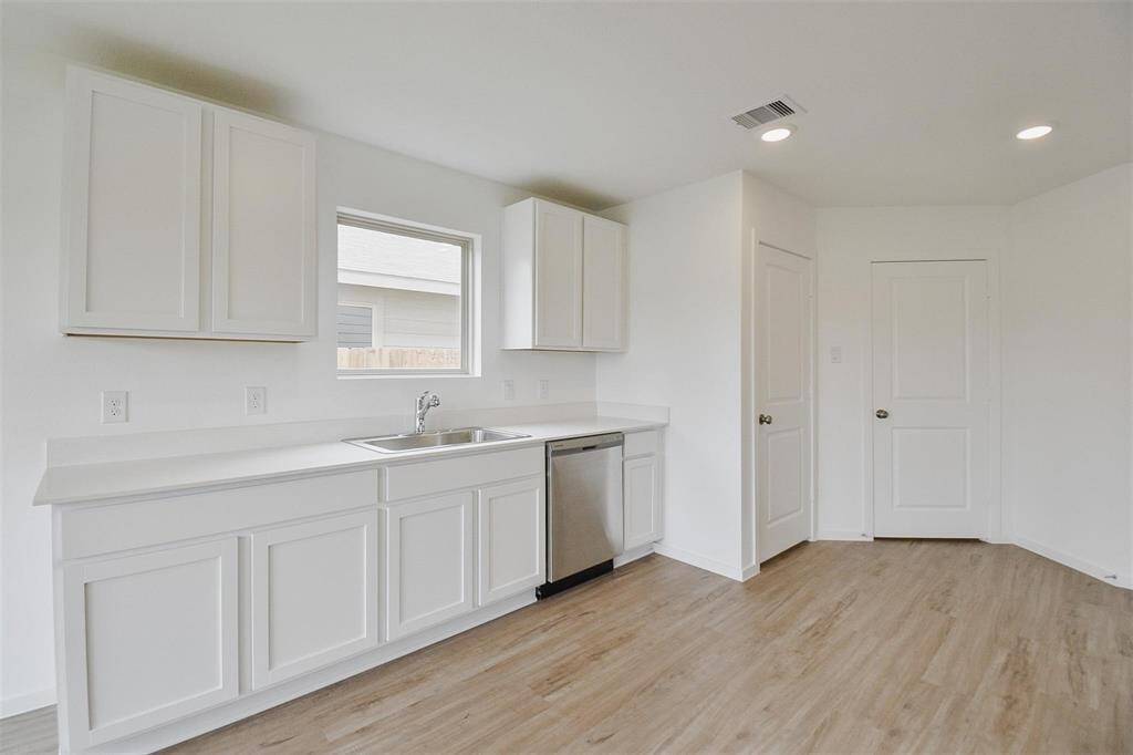spacious kitchen with walk in pantry