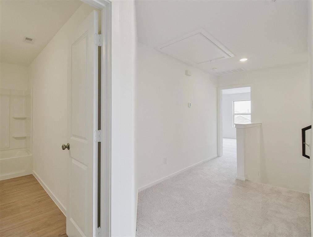 top of stairs landing guest bathroom