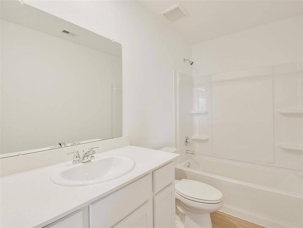 2nd full bath upstairs has one sink and tub/shower combo