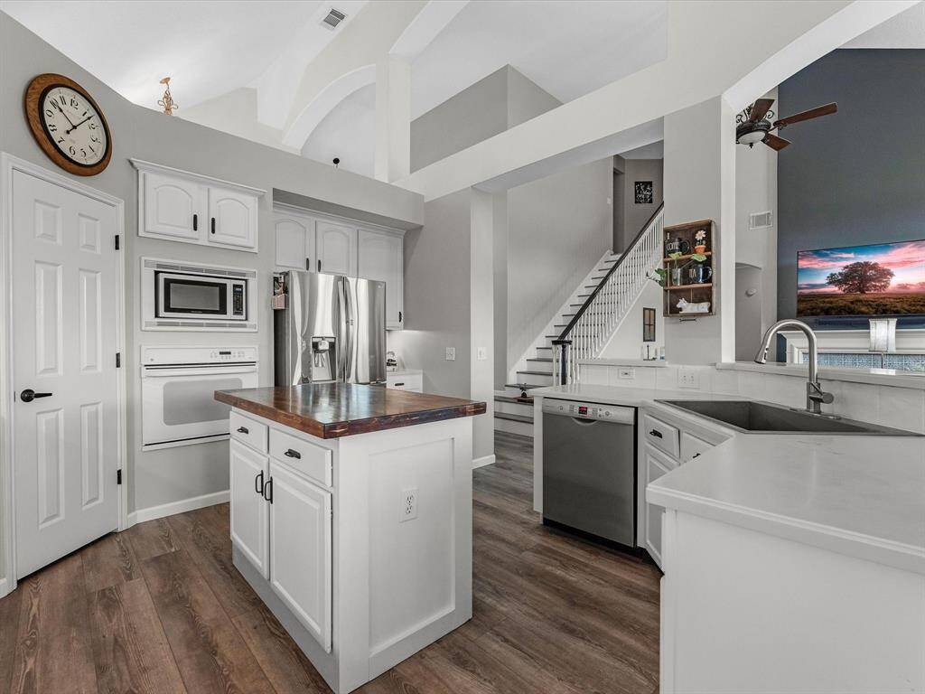Plenty of room to move around in this kitchen and tons of cabinets