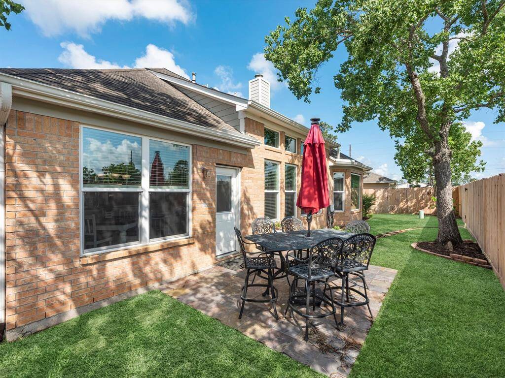 This home backs to the bayou so you can step out for a walk to the community area