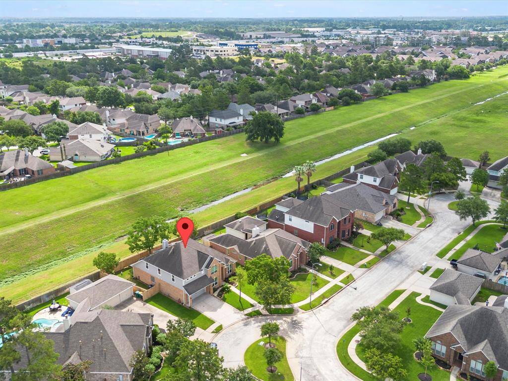 This home sits up in a small cul de sac and backs to a quite bayou