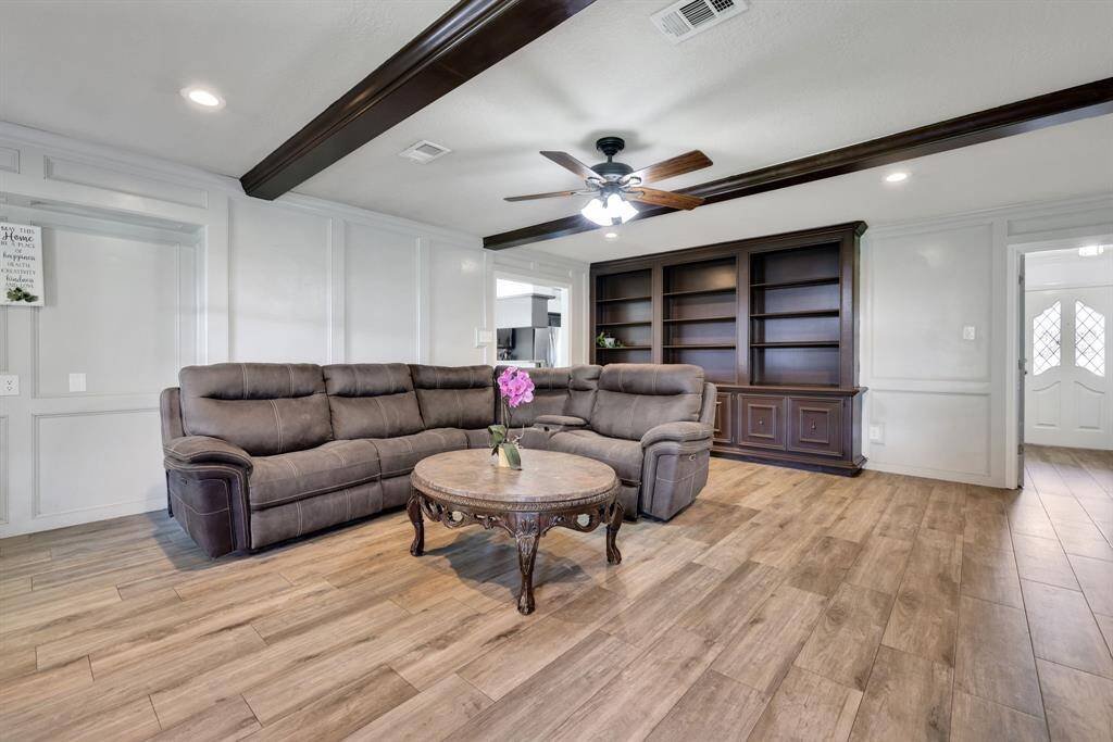 Grand living space with gorgeous built-ins