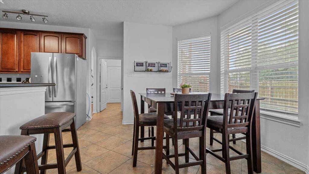 Smartly designed layout with a seamless connection between the kitchen and living room, ideal for entertaining.