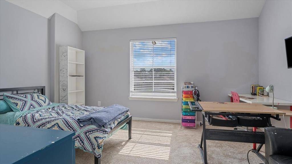 Spacious upstairs bedrooms offer comfort and flexibility