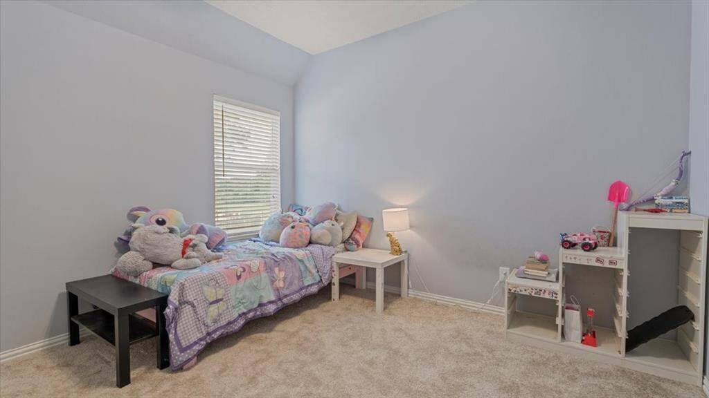 Upstairs bedrooms are impressively sized, providing plenty of room for rest, study, or play.