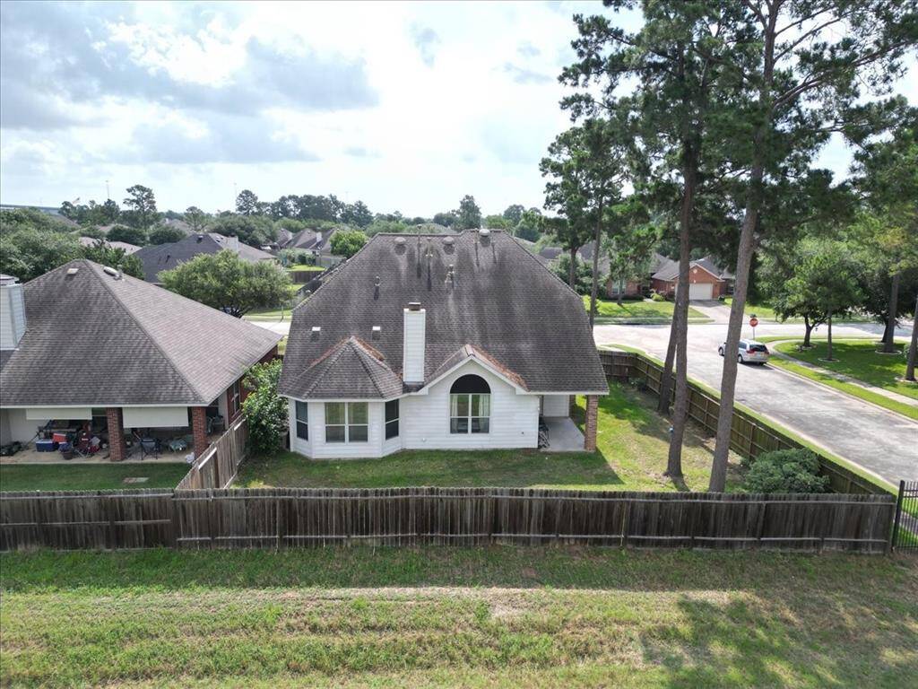 Fenced backyard on a corner lot with no rear neighbors—offering added privacy and space.