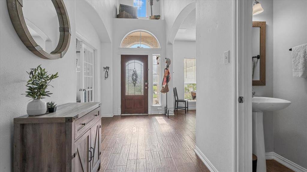 Elegant foyer creates a warm and welcoming first impression.