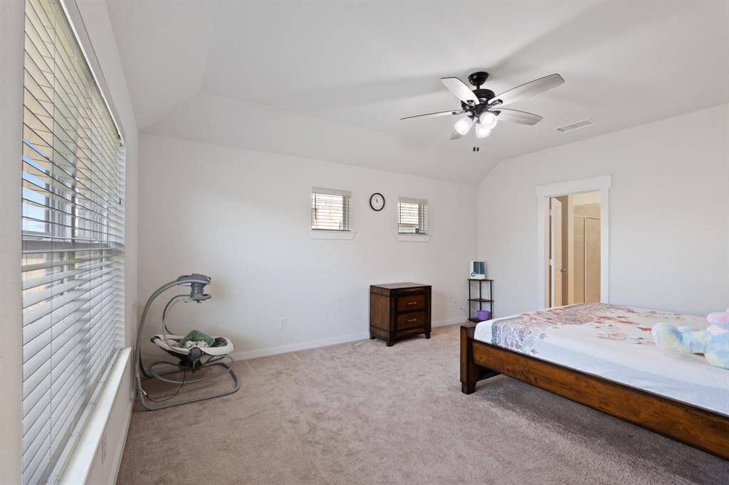 With its tranquil atmosphere, the Primary Bedroom is designed for relaxation, blending comfort and luxury to create a peaceful haven within the home.