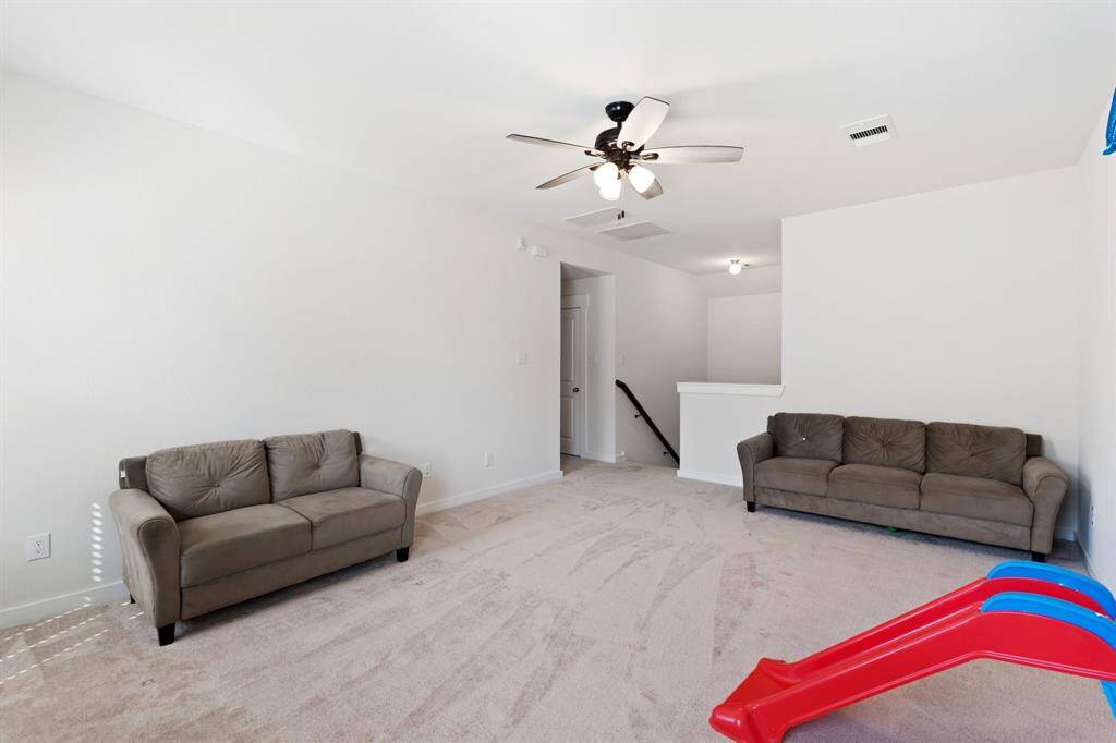 Spacious secondary living area on the second floor is designed for both relaxation and entertainment. This space is perfect for family gatherings, game nights, or simply unwinding in style.