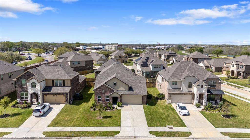 Amazing aerial view of this two-story gem in the highly desirable community of Venetian Village. Nestled on a peaceful lot, this home boasts serene views of the lush landscaping —offering the perfect blend of tranquility and convenience.