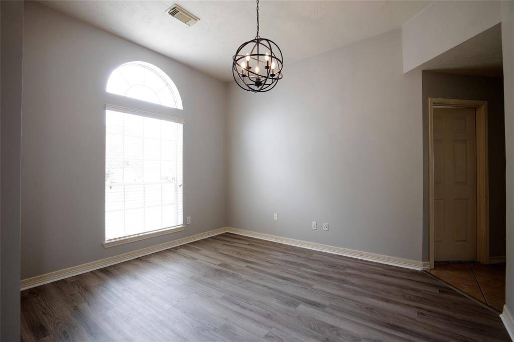 Formal dining room or could be an office