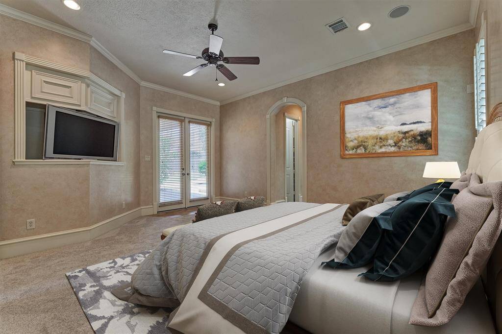 Large sitting area with private, double exterior door to covered back patio. *This photo is virtually staged*