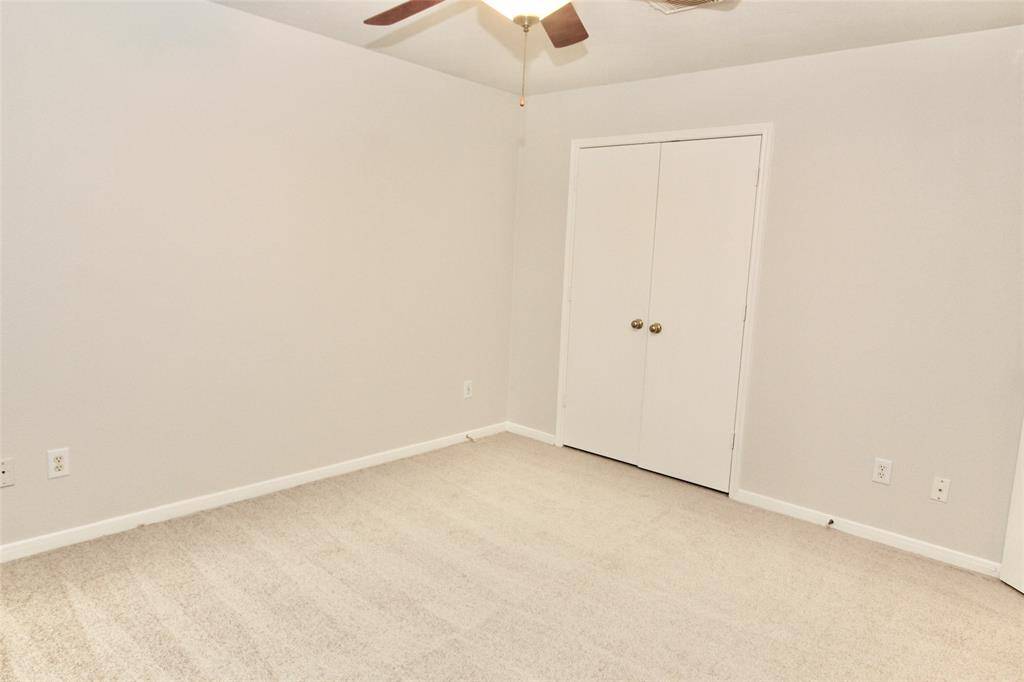 Another view of the primary bedroom