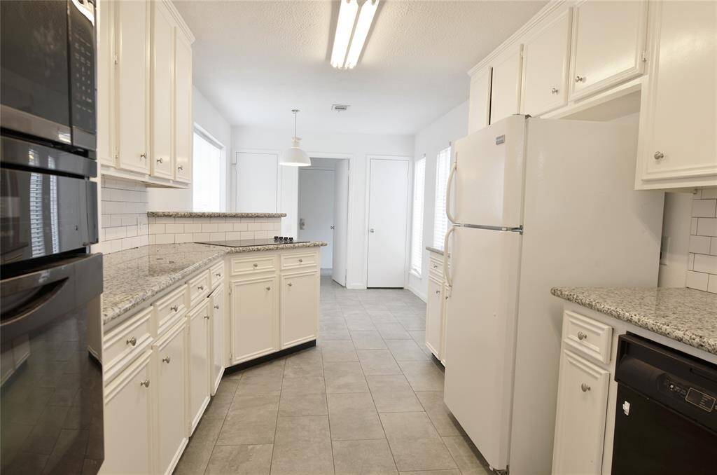 Great size kitchen and breakfast nook.