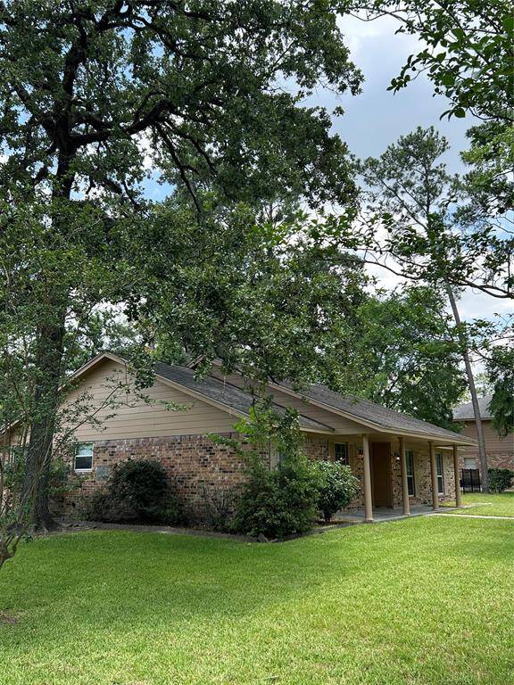 Large trees to shade the house. Blown insulation added to attic in 2022