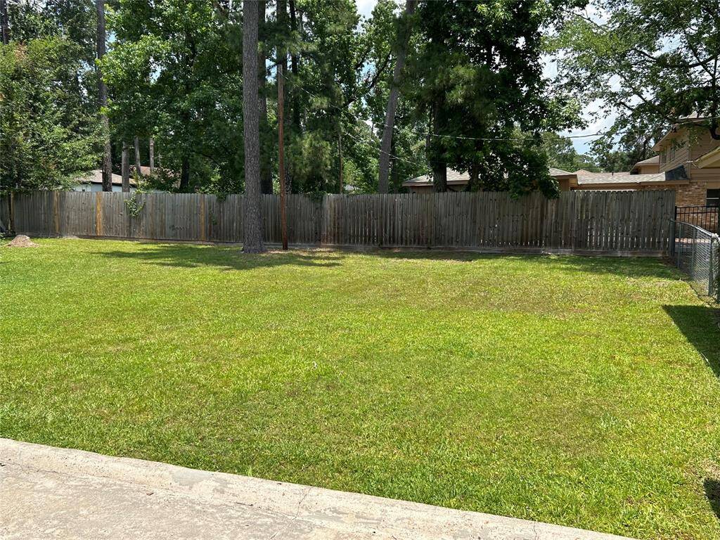 Large backyard with lots of possibilities.