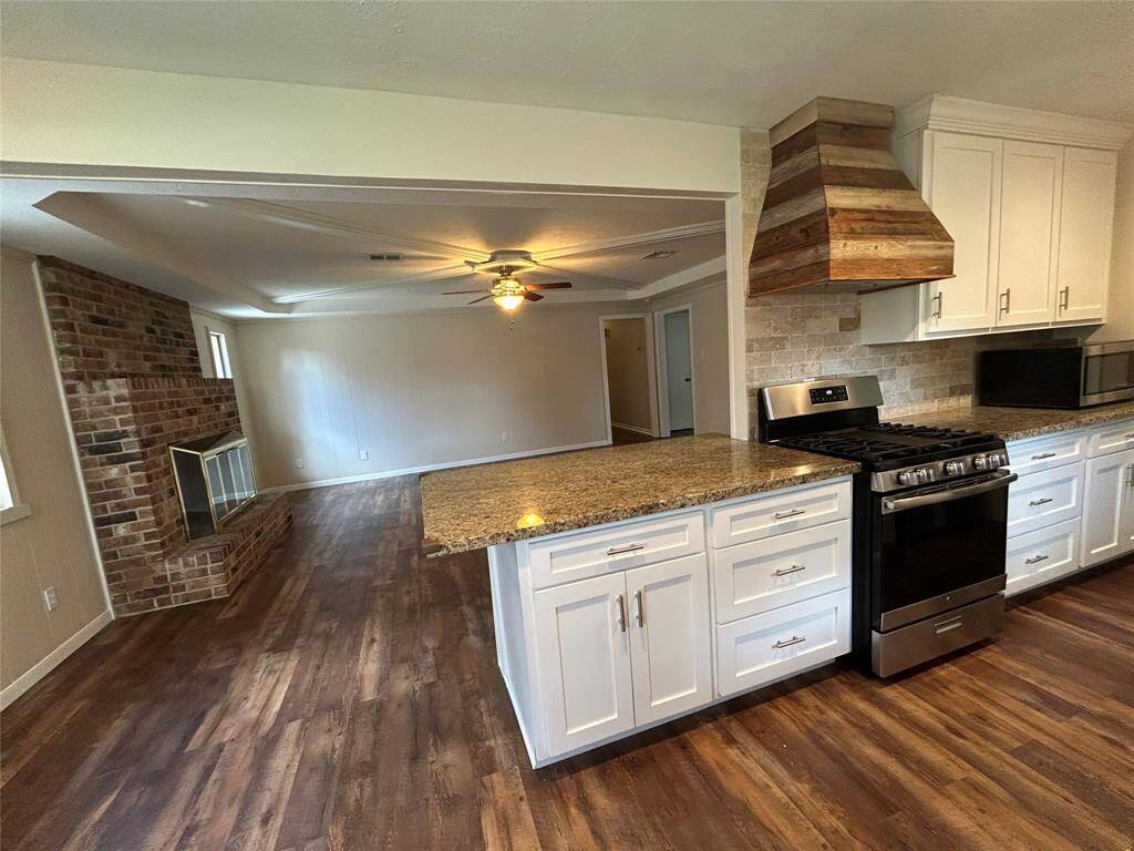 Wood burning fireplace with gas connections