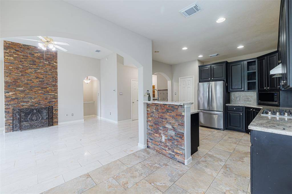 The breakfast room and kitchen is open to the spacious family room.