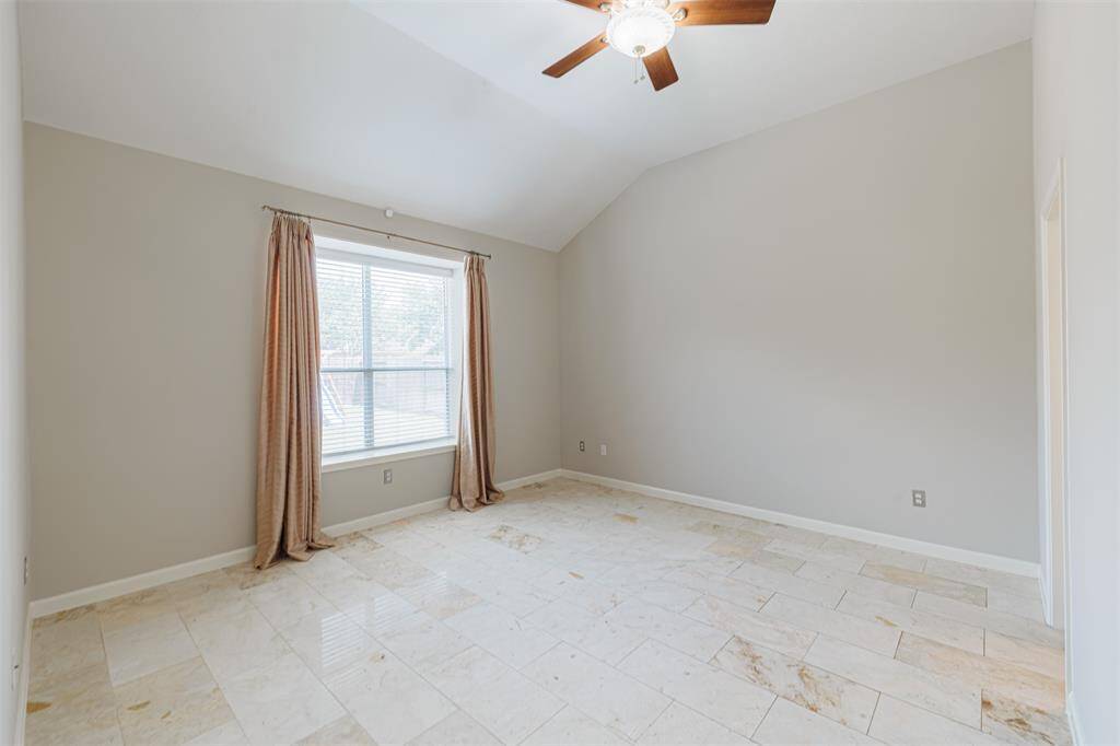 Lovely primary suite with high ceilings.
