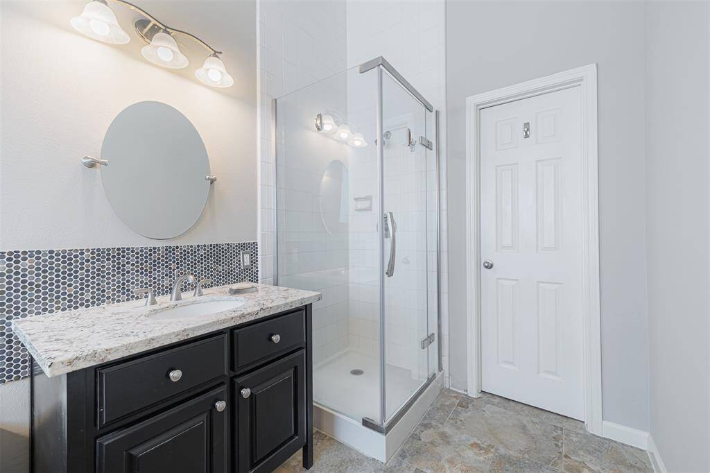 Primary bath has a separate walk-in shower.