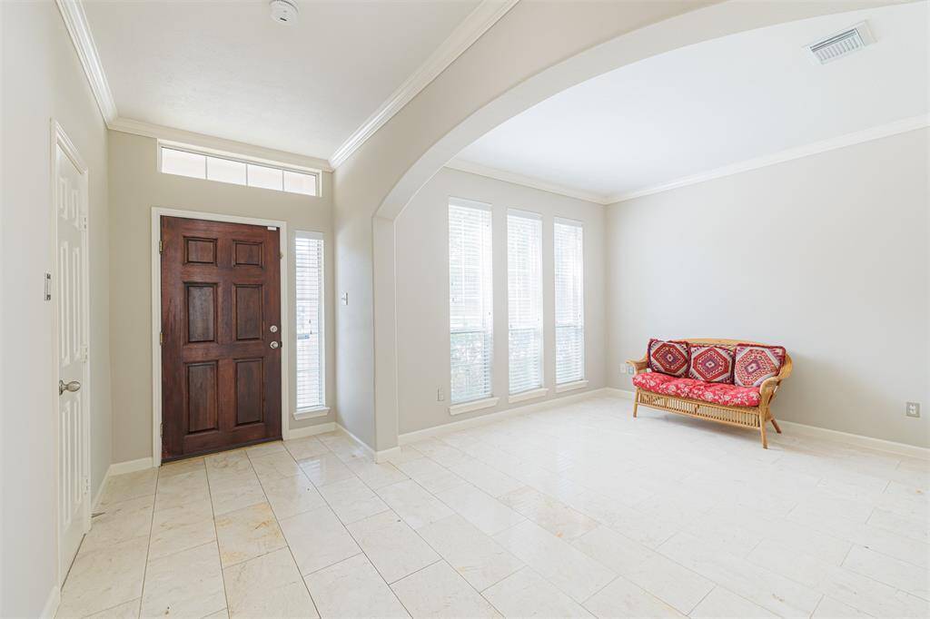Entry with marble flooring.