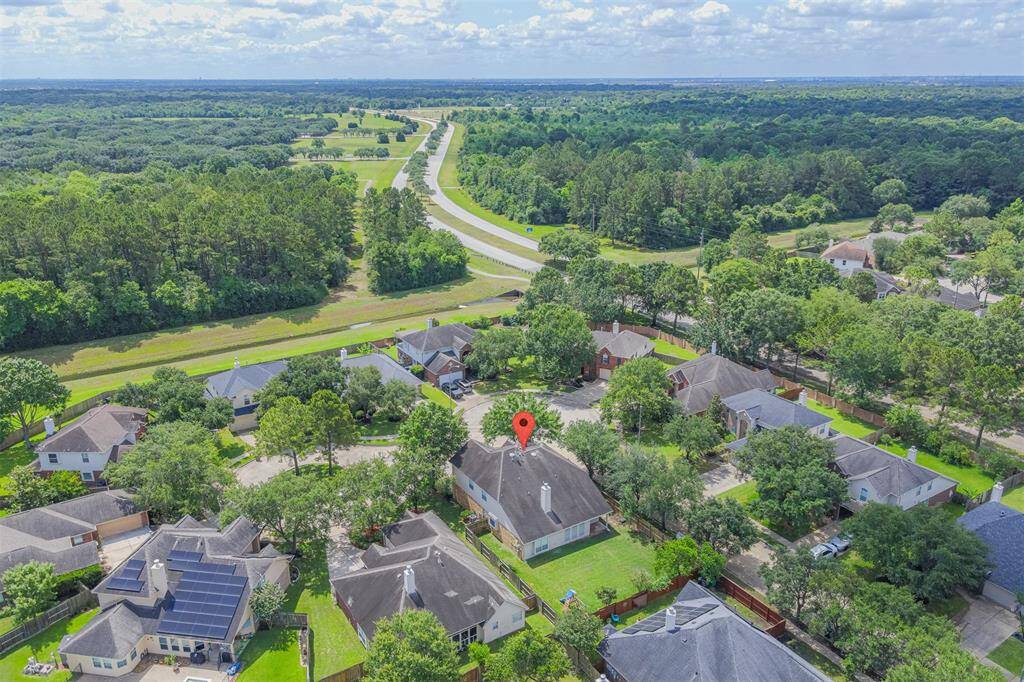 Aerial view of the home and surrounding area.