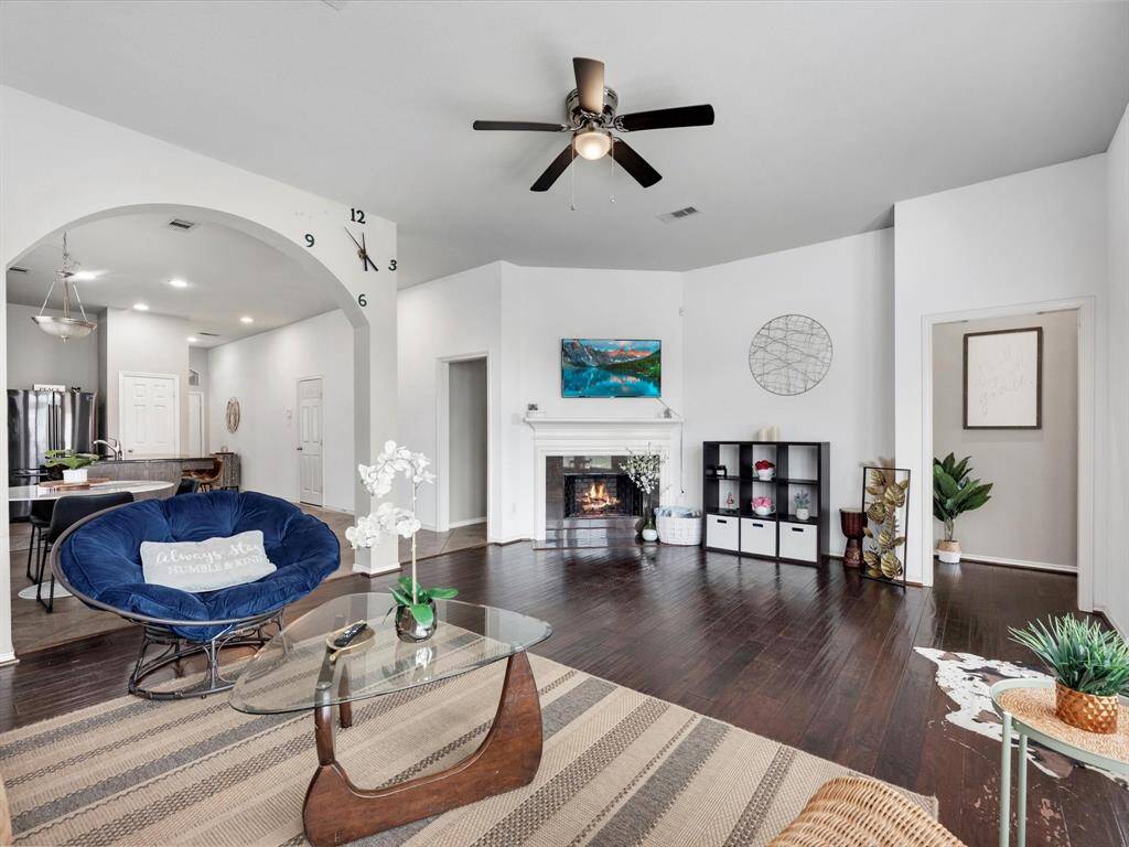 Living room has a fireplace to set the ambiance