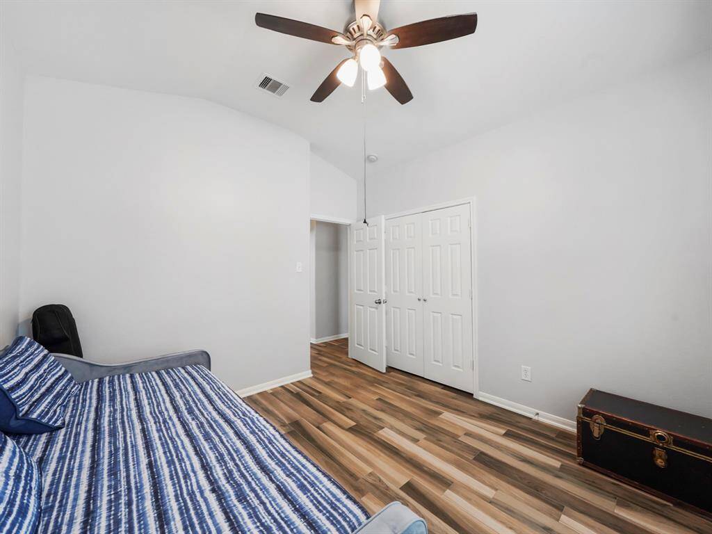 Alternative view of the secondary bedroom #1 showcasing the french door closet space!