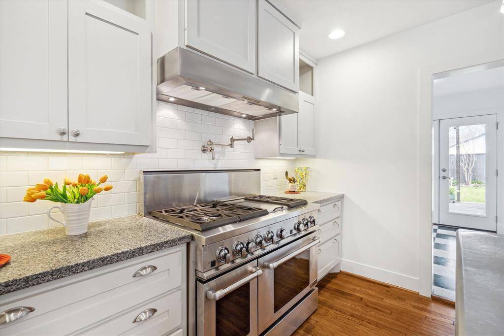 Kitchen highlights include 48" Jennair range, pot filler, hot water dispenser, deep drawers for pots and pans.